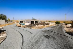 HARRAN BELEDİYESİ KIRSALDA ASFALTLAMA ÇALIŞMALARINI SÜRDÜRÜYOR